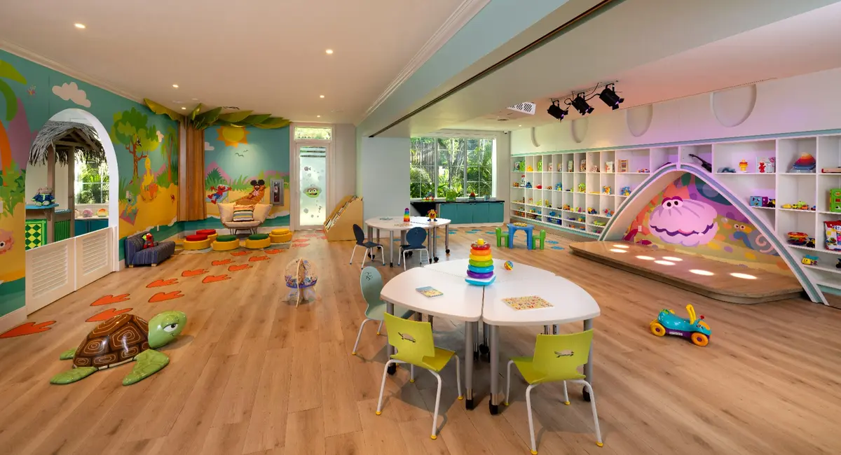 Colorful play spaces and a Sesame Street stage inside the kids camp at Beaches Negril