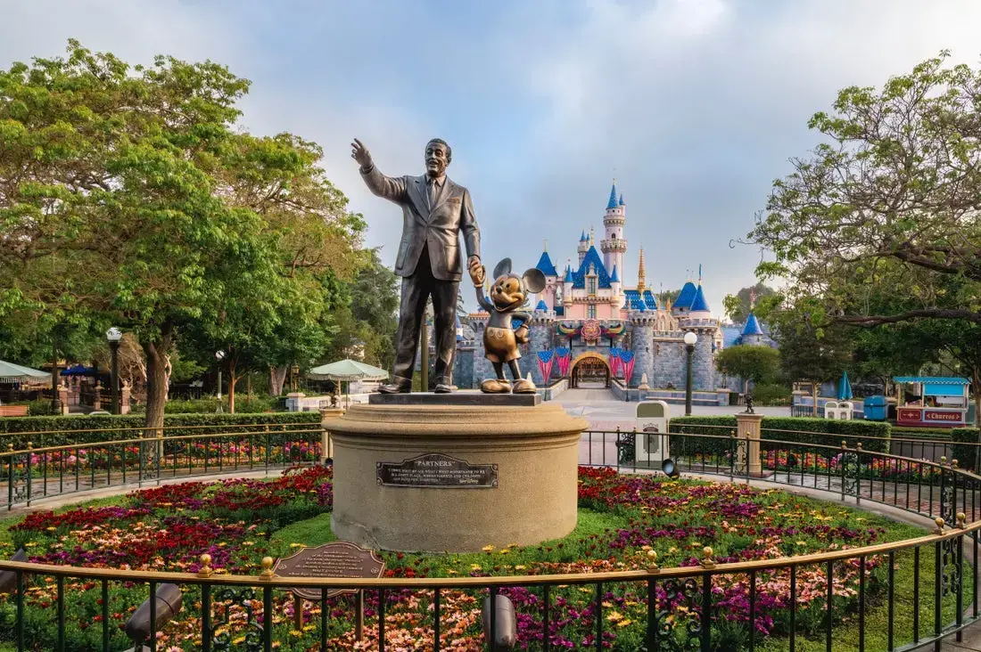 The Partners statue and Sleeping Beauty Castle at Disneyland.