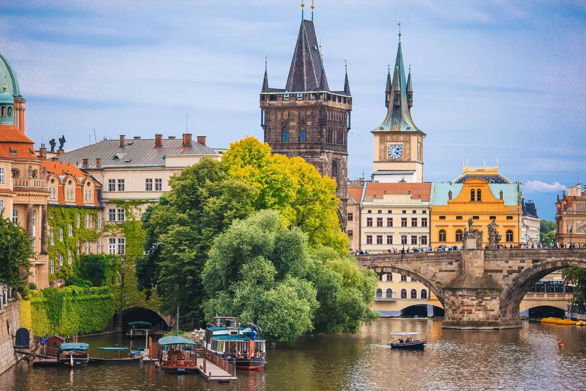 Charles Bridge and historic riverside buildings in Prague