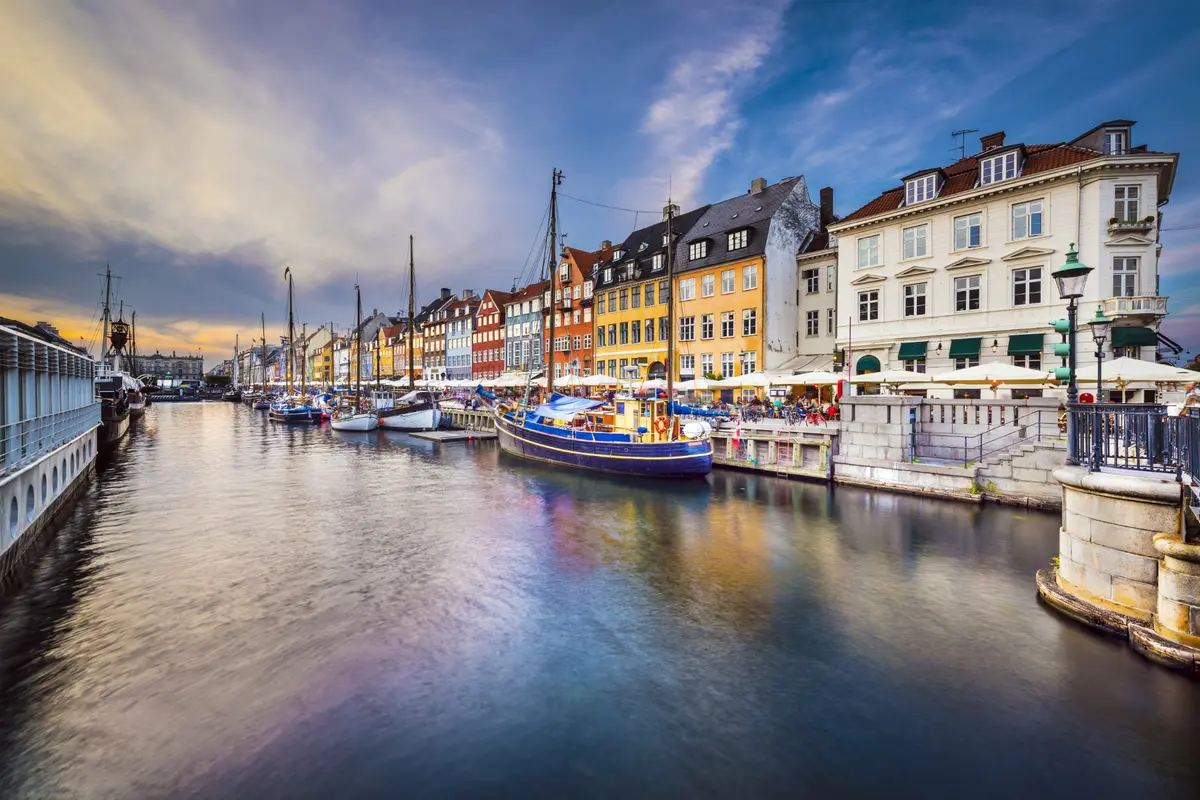 Colorful buildings and boats along Copenhagen’s Nyhavn canal