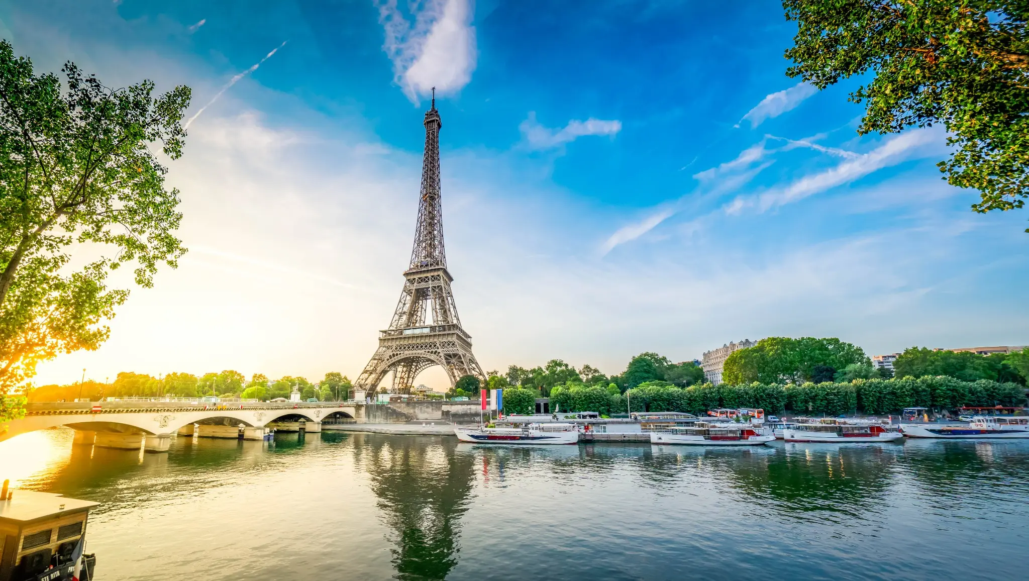 The Eiffel Tower above the Seine in Paris