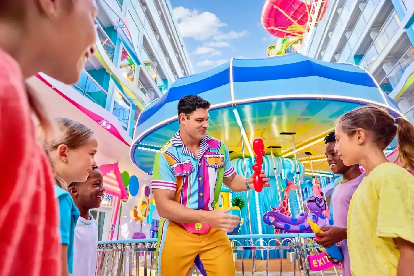A family enjoying refreshments in Royal Caribbean’s Surfside neighborhood.