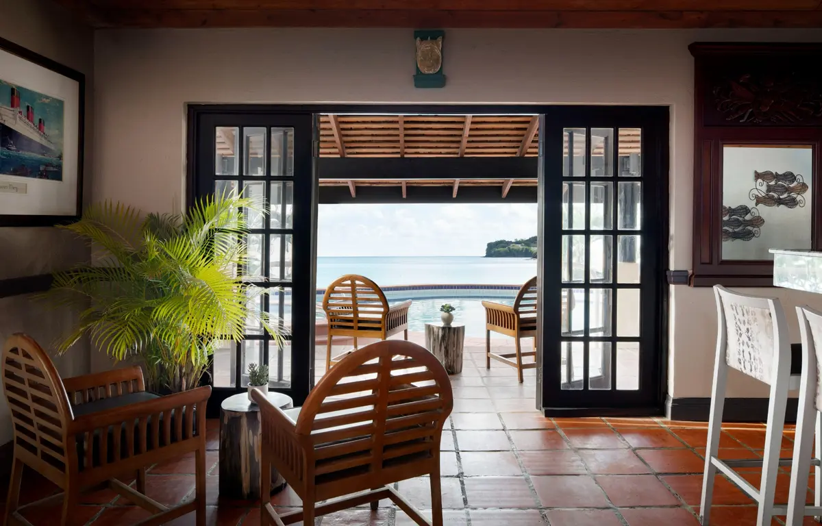 Herbie’s Bar with open doors overlooking the water