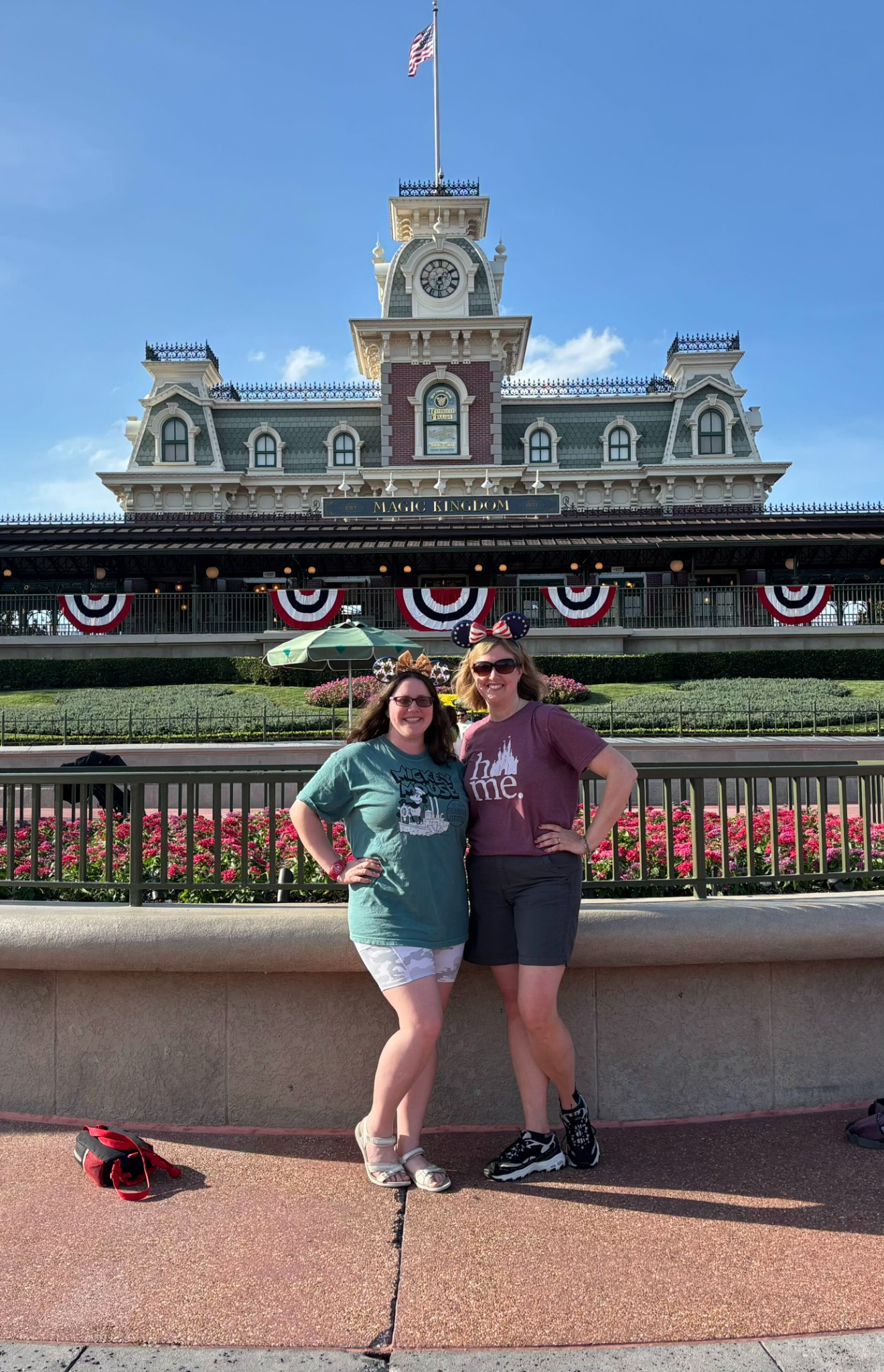 Two advisors in front of the Magic Kingdom train station